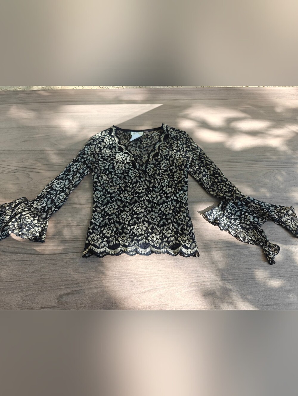 Black Lace-Overlay V-Neck Blouse with Gold Floral Detail